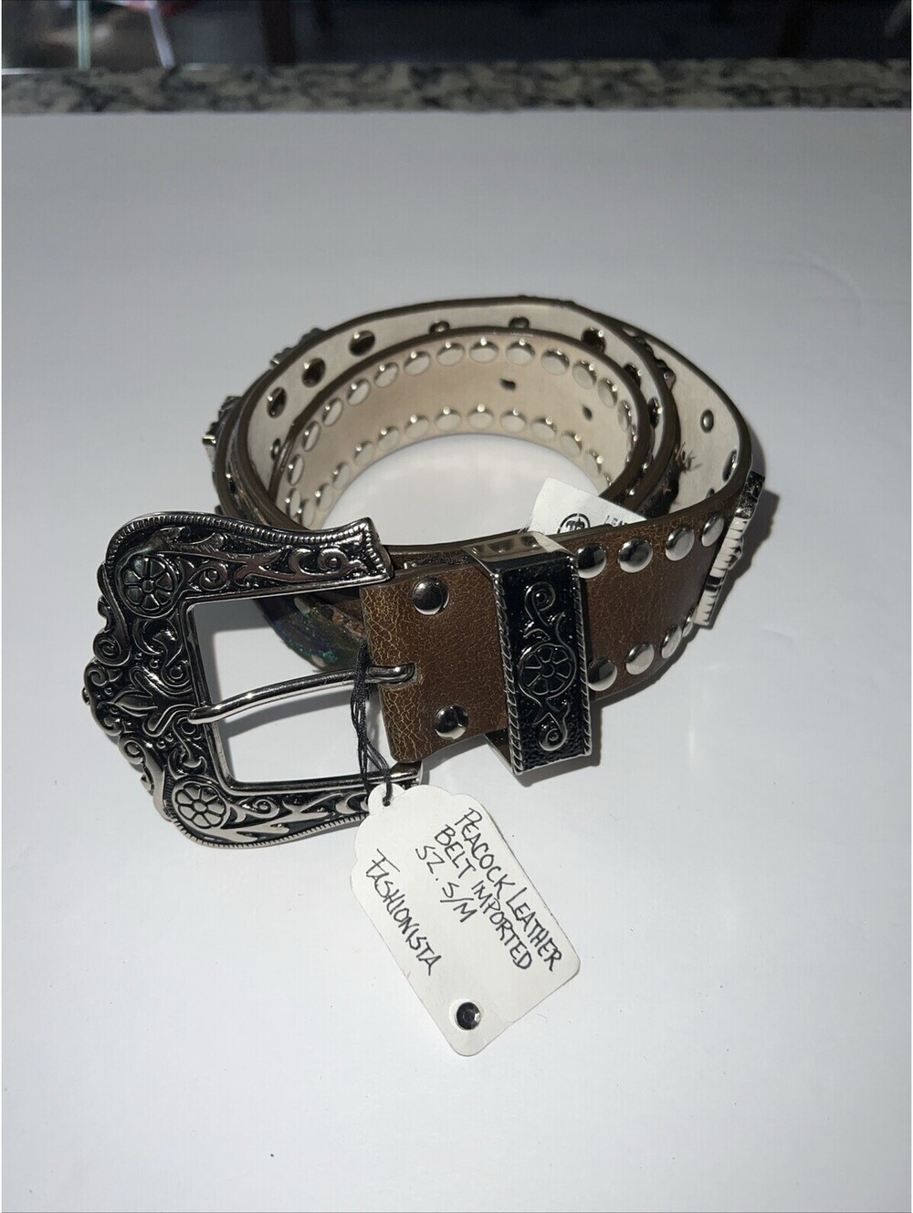 Peacock Leather Belt. Imported.  Size S/M